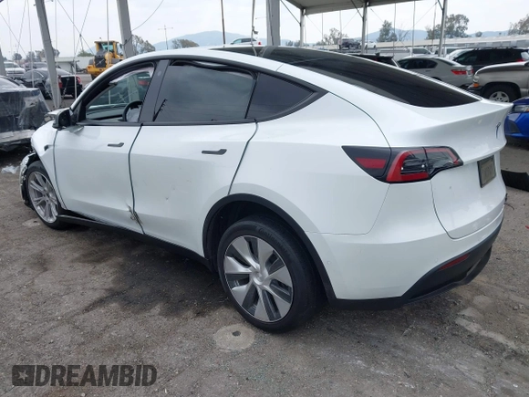 2022 Tesla Model Y Long Range with VIN 7SAYGDEE3NF518061, listed as a IAAI auction lot 41896233 with 34,714 mi miles and . Bid and sale history available at carsss.com. Image 3.