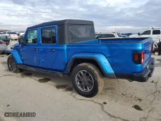 2023 Jeep Gladiator Overland with VIN 1C6HJTFG1PL515353, listed as a Copart auction lot 88072265 with 32,301 mi miles and Salvage Title. Bid and sale history available at carsss.com. Image 2.
