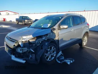 2014 Ford Escape Titanium with VIN 1FMCU9J94EUD01966, listed as a IAAI auction lot 41226043 with 132,730 mi miles. Bid and sale history available at carsss.com. Image 18.