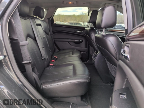 2014 Cadillac SRX Premium Collection z VIN 3GYFNGE34ES676646, wystawiony jako Copart lot #53478695 z przebiegiem 115 096 mil mil oraz Szkoda całkowita • Salvage title. Historia ofert i sprzedaży dostępna na DreamBid. Obrazek 11.