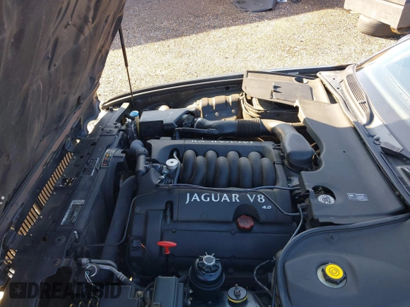 2000 Jaguar XJ with VIN SAJDA23C5YLF19267, listed as a IAAI auction lot 40899052 with 92,553 mi miles and . Bid and sale history available at DreamBid. Image 10.