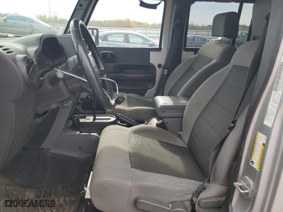 2008 Jeep Wrangler Unlimited X with VIN 1J4GA39138L546823, listed as a Copart auction lot 51698665 with 268,652 mi miles and Salvage Title. Bid and sale history available at carsss.com. Image 7.