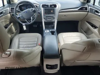 2017 Ford Fusion SE z VIN 3FA6P0H92HR203496, wystawiony jako Copart lot #56719365 z przebiegiem 99 817 mil mil oraz Szkoda całkowita • Salvage title. Historia ofert i sprzedaży dostępna na DreamBid. Obrazek 8.