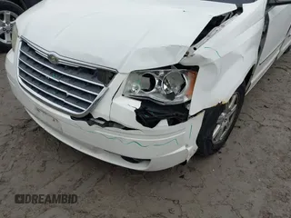 2010 Chrysler Town & Country Touring with VIN 2A4RR5D19AR441155, listed as a IAAI auction lot 41848553 with 197,088 mi miles. Bid and sale history available at carsss.com. Image 6.