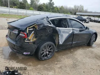 2019 Tesla Model 3 Mid Range z VIN 5YJ3E1EA8KF297299, wystawiony jako Copart lot #47935394 z przebiegiem 117 644 mil mil oraz Szkoda całkowita • Salvage title. Historia ofert i sprzedaży dostępna na DreamBid. Obrazek 3.