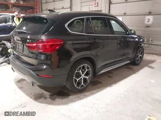 2016 BMW X1 xDrive28i with VIN WBXHT3C33GP886935, listed as a IAAI auction lot 41707367 with 73,201 mi miles. Bid and sale history available at carsss.com. Image 4.
