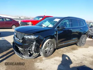 2022 Cadillac XT6 Premium Luxury with VIN 1GYKPCRS1NZ121711, listed as a IAAI auction lot 41149624 with 62,887 mi miles and . Bid and sale history available at DreamBid. Image 2.