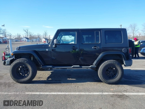 2010 Jeep Wrangler Unlimited Sahara with VIN 1J4HA5H16AL215659, listed as a IAAI auction lot 41749218 with 55,544 mi miles. Bid and sale history available at carsss.com. Image 14.