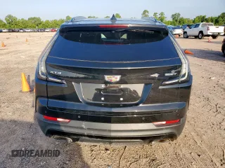 2020 Cadillac XT4 FWD Sport with VIN 1GYFZER45LF146781, listed as a Copart auction lot 65171615 with 65,177 mi miles and Salvage title. Bid and sale history available at DreamBid. Image 6.