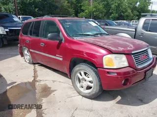 2006 GMC Envoy SLE z VIN 1GKDS13S362314323, wystawiony jako IAAI lot #42476958 z przebiegiem 164 322 mil mil oraz . Historia ofert i sprzedaży dostępna na DreamBid. Obrazek 1.