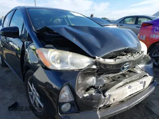2012 Toyota Prius c One with VIN JTDKDTB36C1010956, listed as a IAAI auction lot 41476271 with 186,403 mi miles. Bid and sale history available at carsss.com. Image 6.