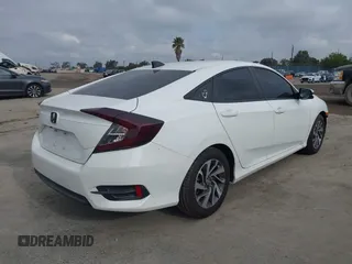 2018 Honda Civic EX with VIN 2HGFC2F74JH566761, listed as a IAAI auction lot 42117730 with 73,946 mi miles and . Bid and sale history available at DreamBid. Image 4.