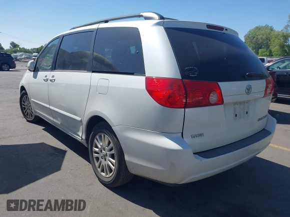 2010 Toyota Sienna XLE with VIN 5TDYK4CC3AS294129, listed as a IAAI auction lot 42510201 with 200,601 mi miles and . Bid and sale history available at DreamBid. Image 3.