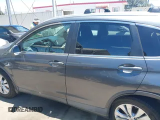 2013 Honda CR-V EX-L with VIN 2HKRM4H76DH646060, listed as a IAAI auction lot 42624207 with 208,519 mi miles and . Bid and sale history available at DreamBid. Image 14.