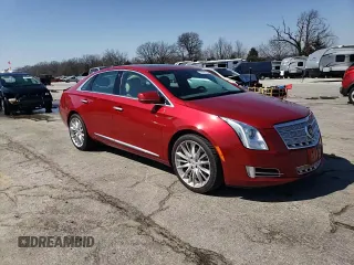 2013 Cadillac XTS Platinum z VIN 2G61V5S32D9174001, wystawiony jako Copart lot #48696365 z przebiegiem 94 028 mil mil oraz Szkoda całkowita • Salvage title. Historia ofert i sprzedaży dostępna na DreamBid. Obrazek 13.