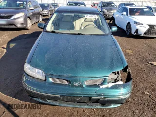 1998 Oldsmobile Cutlass GLS z VIN 1G3NG52M6W6326292, wystawiony jako Copart lot #42117435 z przebiegiem 129 999 mil mil oraz Szkoda całkowita • Salvage title. Historia ofert i sprzedaży dostępna na DreamBid. Obrazek 5.
