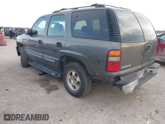 2002 Chevrolet Tahoe LS with VIN 1GNEC13V22R226380, listed as a IAAI auction lot 41261772 with 311,749 mi miles. Bid and sale history available at carsss.com. Image 3.