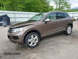 2013 Volkswagen Touareg Exec с VIN WVGEF9BP4DD007109, выставлен на аукционе Copart как лот 58890665 с пробегом 157 286 миль миль и Списание • Salvage title. История ставок и продаж доступна на DreamBid. Изображение 1.