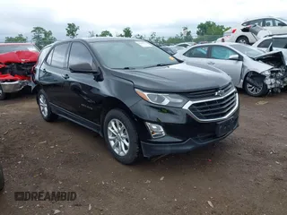 2019 Chevrolet Equinox LS z VIN 2GNAXHEVXK6291076, wystawiony jako IAAI lot #42340361 z przebiegiem 98 959 mil mil oraz . Historia ofert i sprzedaży dostępna na DreamBid. Obrazek 1.