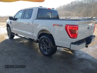 2023 Ford F-150 XL with VIN 1FTFW1E58PFB33406, listed as a IAAI auction lot 41768342 with 42,054 mi miles. Bid and sale history available at carsss.com. Image 3.