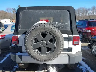 2012 Jeep Wrangler Arctic with VIN 1C4GJWBG9CL290847, listed as a IAAI auction lot 41281316 with 106,473 mi miles. Bid and sale history available at carsss.com. Image 16.