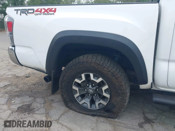 2023 Toyota Tacoma SR with VIN 3TMCZ5AN1PM556299, listed as a IAAI auction lot 42344160 with 42,338 mi miles and . Bid and sale history available at DreamBid. Image 19.