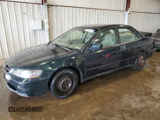 1999 Honda Accord LX with VIN JHMCG665XXC001307, listed as a Copart auction lot 65191725 with 194,535 mi miles and Salvage title. Bid and sale history available at DreamBid. Image 1.