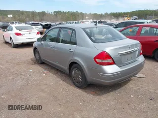 2008 Nissan Versa 1.8 S with VIN 3N1BC11E98L383504, listed as a IAAI auction lot 41882268 with 118,770 mi miles. Bid and sale history available at carsss.com. Image 3.