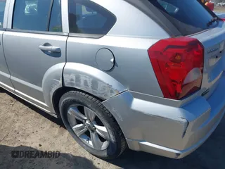 2011 Dodge Caliber Mainstreet with VIN 1B3CB3HA9BD295750, listed as a IAAI auction lot 42049996 with Not Provided miles. Bid and sale history available at carsss.com. Image 17.