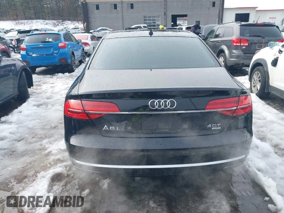 2015 Audi A8 L 4.0T with VIN WAU32AFD2FN033629, listed as a IAAI auction lot 41448956 with 120,364 mi miles. Bid and sale history available at carsss.com. Image 17.