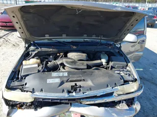 2003 Chevrolet Tahoe LS with VIN 1GNEK13Z03J294201, listed as a IAAI auction lot 41656836 with 302,922 mi miles. Bid and sale history available at carsss.com. Image 10.