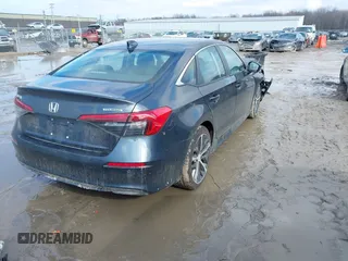2024 Honda Civic Sedan Touring with VIN 2HGFE1F93RH340101, listed as a IAAI auction lot 41672822 with 4,746 mi miles. Bid and sale history available at carsss.com. Image 4.