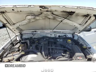 2000 Jeep Cherokee with VIN 1J4FT48S6YL152495, listed as a Copart auction lot 60627965 with 196,086 mi miles and Salvage title. Bid and sale history available at DreamBid. Image 12.