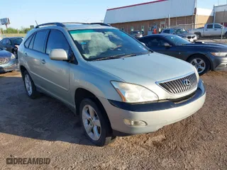 2004 Lexus RX 330 with VIN JTJGA31U540043685, listed as a IAAI auction lot 42088922 with 252,133 mi miles. Bid and sale history available at carsss.com. Image 1.