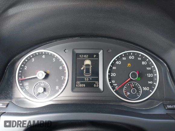 2012 Volkswagen Tiguan SE with VIN WVGBV7AX5CW561368, listed as a IAAI auction lot 42197389 with 63,809 mi miles and . Bid and sale history available at DreamBid. Image 7.