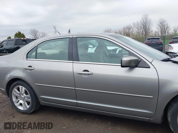2009 Ford Fusion SEL with VIN 3FAHP08109R102428, listed as a IAAI auction lot 41951682 with 106,255 mi miles. Bid and sale history available at carsss.com. Image 14.