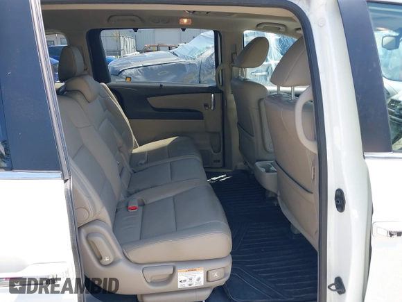 2014 Honda Odyssey EX-L z VIN 5FNRL5H69EB088589, wystawiony jako IAAI lot #42418952 z przebiegiem 96 767 mil mil oraz . Historia ofert i sprzedaży dostępna na DreamBid. Obrazek 8.