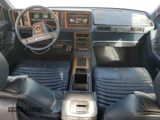 1988 Cadillac Seville z VIN 1G6KS5152JU809989, wystawiony jako Copart lot #51385205 z przebiegiem 40 217 mil mil oraz Czysty tytuł • Clean title. Historia ofert i sprzedaży dostępna na DreamBid. Obrazek 8.