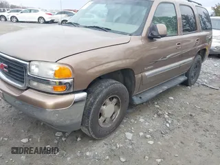 2003 GMC Yukon SLT with VIN 1GKEC13T73R126739, listed as a IAAI auction lot 41361906 with 166,748 mi miles. Bid and sale history available at carsss.com. Image 2.