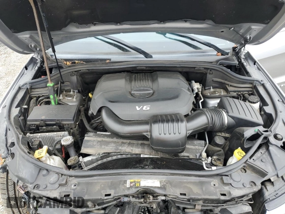 2015 Jeep Grand Cherokee Overland with VIN 1C4RJECG4FC808241, listed as a Copart auction lot 59699685 with 67,542 mi miles and Salvage title. Bid and sale history available at DreamBid. Image 12.