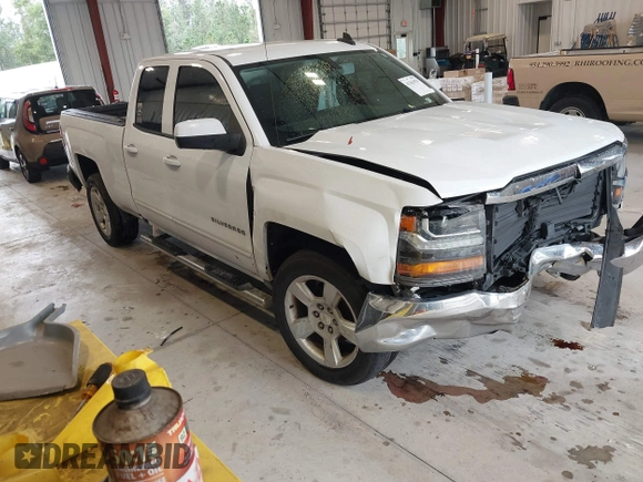 2018 Chevrolet Silverado 1500 LT with VIN 1GCRCREC0JZ204834, listed as a IAAI auction lot 41363579 with 135,247 mi miles and . Bid and sale history available at DreamBid. Image 1.