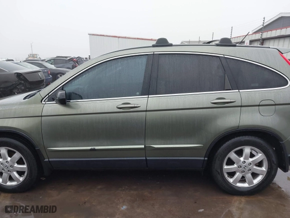 2009 Honda CR-V EX-L with VIN JHLRE38709C007153, listed as a IAAI auction lot 41443864 with 259,822 mi miles. Bid and sale history available at carsss.com. Image 15.