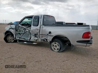 1999 Ford F-150 with VIN 1FTRX07W0XKB88434, listed as a Copart auction lot 60063135 with 277,188 mi miles and Salvage title. Bid and sale history available at DreamBid. Image 2.