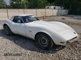 1974 Chevrolet Corvette with VIN 1Z67J4S405054, listed as a Copart auction lot 66356575 with 7,810 mi miles and Salvage title. Bid and sale history available at DreamBid. Image 4.