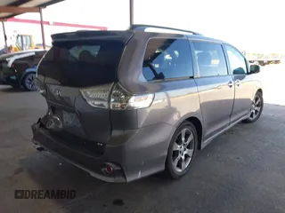 2015 Toyota Sienna SE with VIN 5TDXK3DC1FS667924, listed as a IAAI auction lot 42062805 with 123,504 mi miles. Bid and sale history available at carsss.com. Image 4.