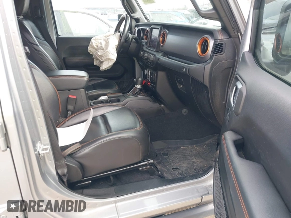 2021 Jeep Gladiator Mojave with VIN 1C6JJTEG9ML519309, listed as a IAAI auction lot 41701544 with 64,461 mi miles and . Bid and sale history available at DreamBid. Image 5.