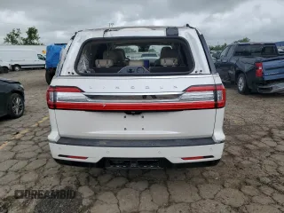 2019 Lincoln Navigator Reserve with VIN 5LMJJ2LT1KEL25094, listed as a Copart auction lot 58539865 with 63,167 mi miles and Salvage title. Bid and sale history available at DreamBid. Image 6.