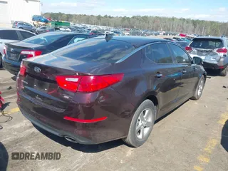 2015 Kia Optima LX z VIN 5XXGM4A71FG463939, wystawiony jako IAAI lot #41838294 z przebiegiem 70 274 mil mil oraz . Historia ofert i sprzedaży dostępna na DreamBid. Obrazek 4.