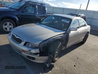 1997 Mazda Millenia S with VIN JM1TA2229V1307575, listed as a Copart auction lot 87040954 with 160,513 mi miles and Salvage Title. Bid and sale history available at DreamBid. Image 1.