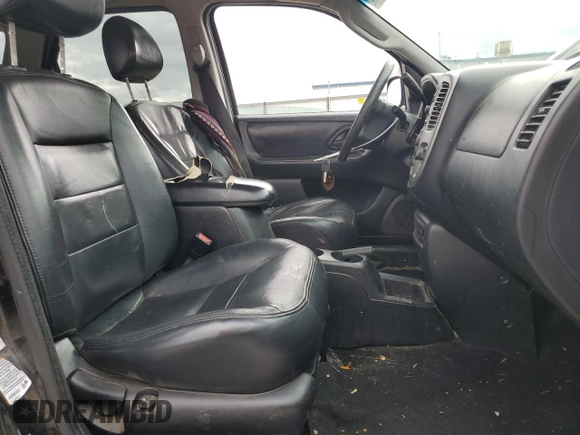 2004 Ford Escape Limited with VIN 1FMCU04134KA61949, listed as a Copart auction lot 47377455 with 205,480 mi miles and Salvage title. Bid and sale history available at DreamBid. Image 7.